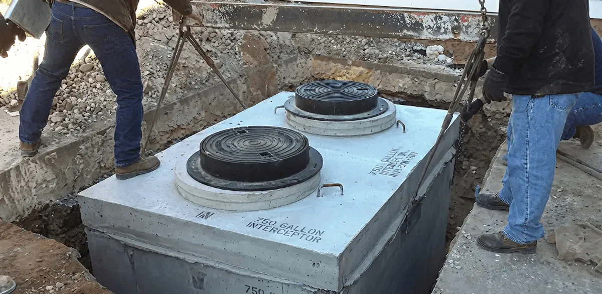 Grease trap installation for a commercial property drainage system in Marietta, GA